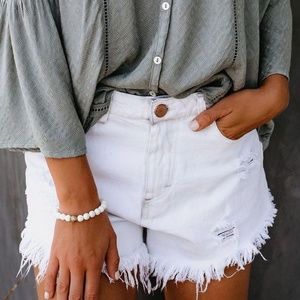 White Distressed Denim Cut Off Shorts